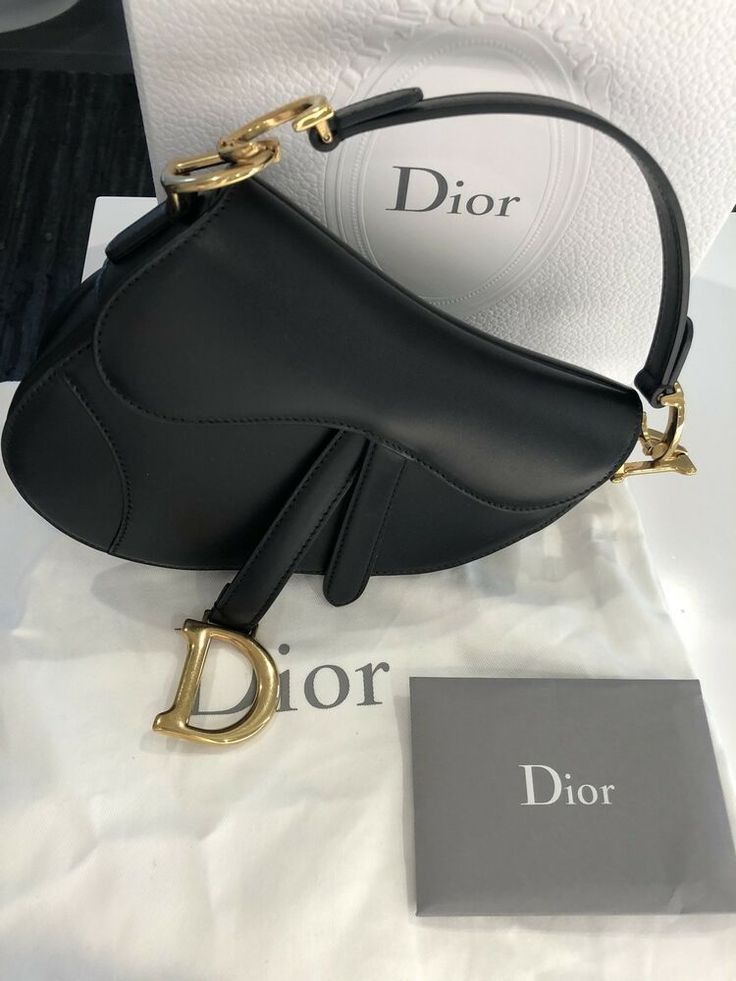 Dior Vintage Black Leather Saddle Bag with Gold Ornaments product image 1, provided for visual reference and product detail