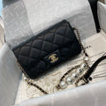 Chanel Pearl Logo Strap Flap Bag Black product image 1, provided for visual reference and product detail review