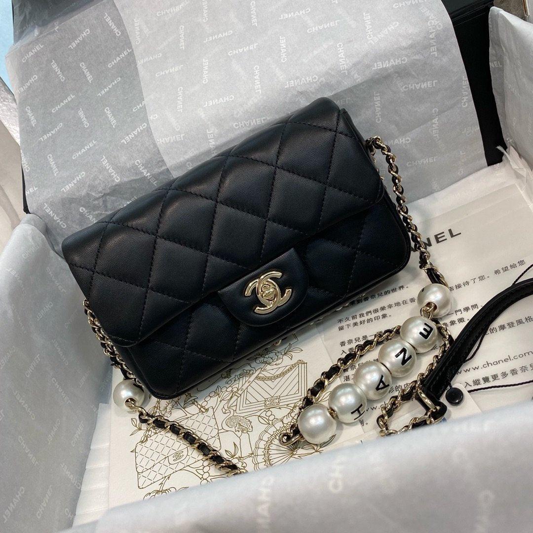 Chanel Pearl Logo Strap Flap Bag Black product image 1, provided for visual reference and product detail review
