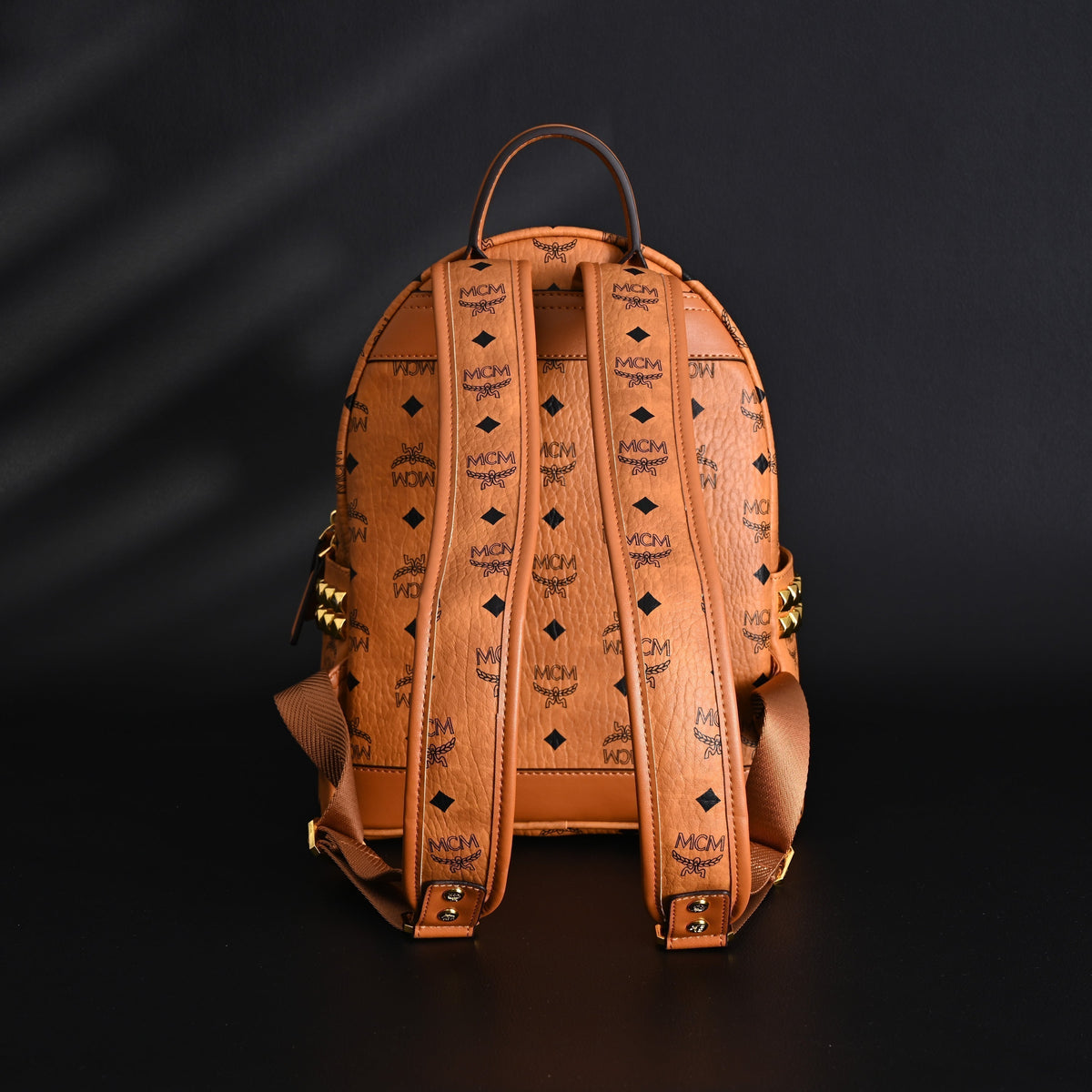 Mcm Stark Visetos Medium Backpack – Cognac Monogram with Gold-Tone Studs - Cognac with Black Monogram Print product image 4,