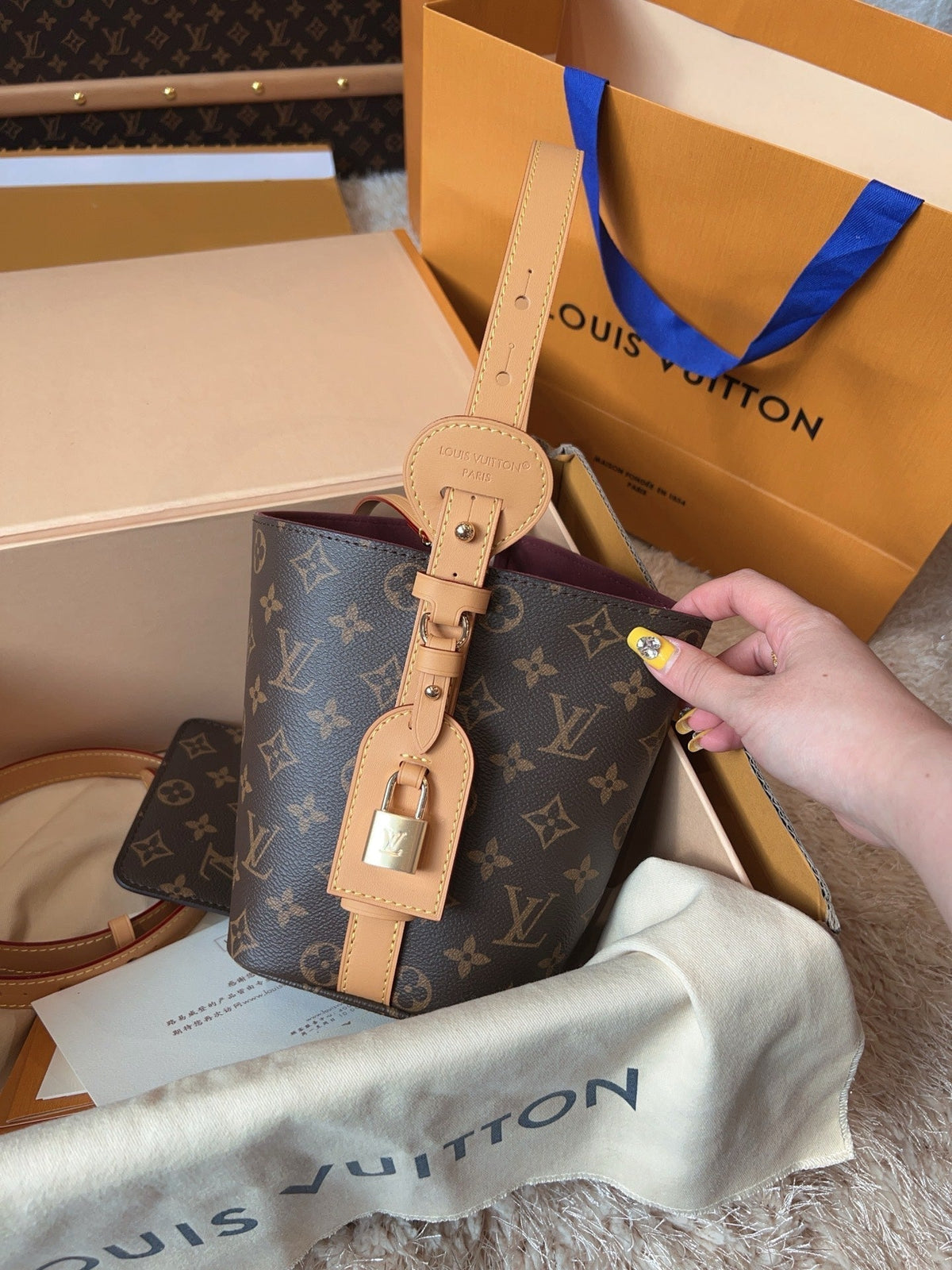 LV Sac Noé BB Monogram Canvas Bucket Shoulder Bag with Leather Trim and Drawstring Closure product image 1, provided for