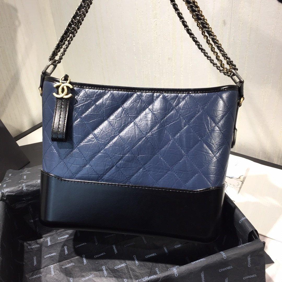 Chanel's Gabrielle Large Hobo Bag - Blue & Brown product image 1, provided for visual reference and product detail review