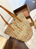 YSL Panier Medium in Raffia and Vegetable-Tanned Leather Tote Bag - Yellow product image 1, provided for visual reference