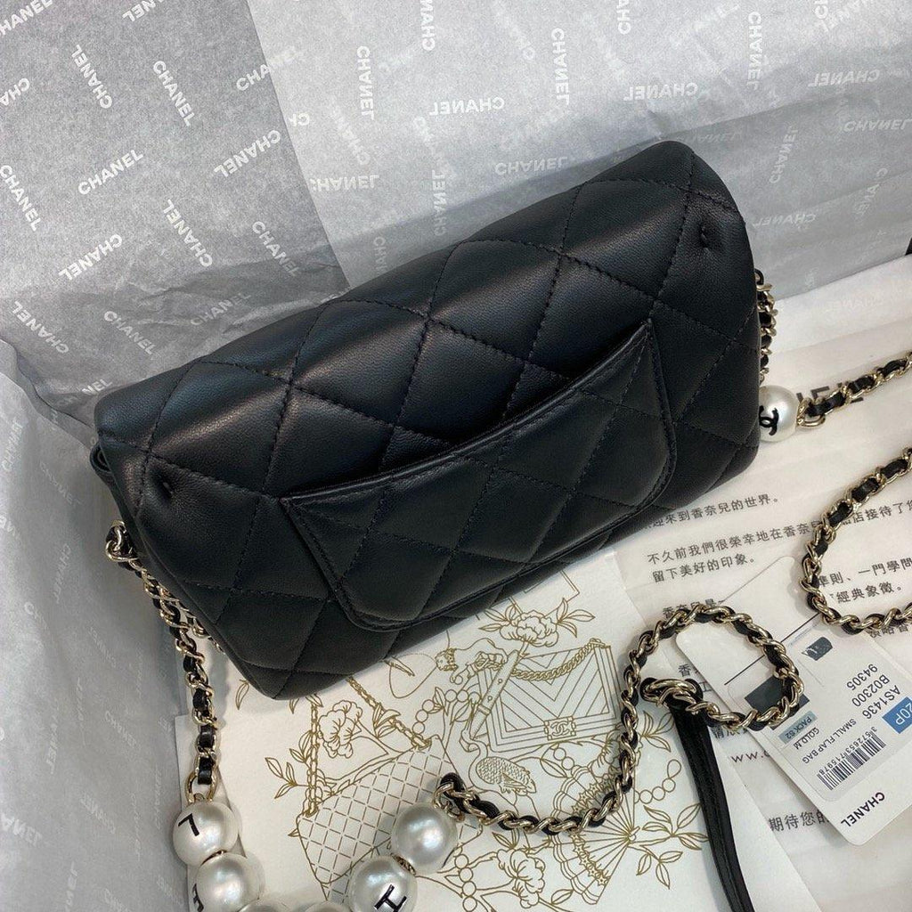 Chanel Pearl Logo Strap Flap Bag Black product image 2, provided for visual reference and product detail review