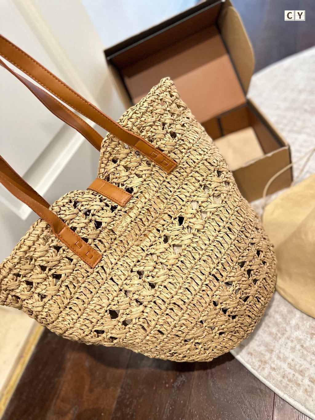 YSL Panier Medium in Raffia and Vegetable-Tanned Leather Tote Bag - Yellow product image 3, provided for visual reference