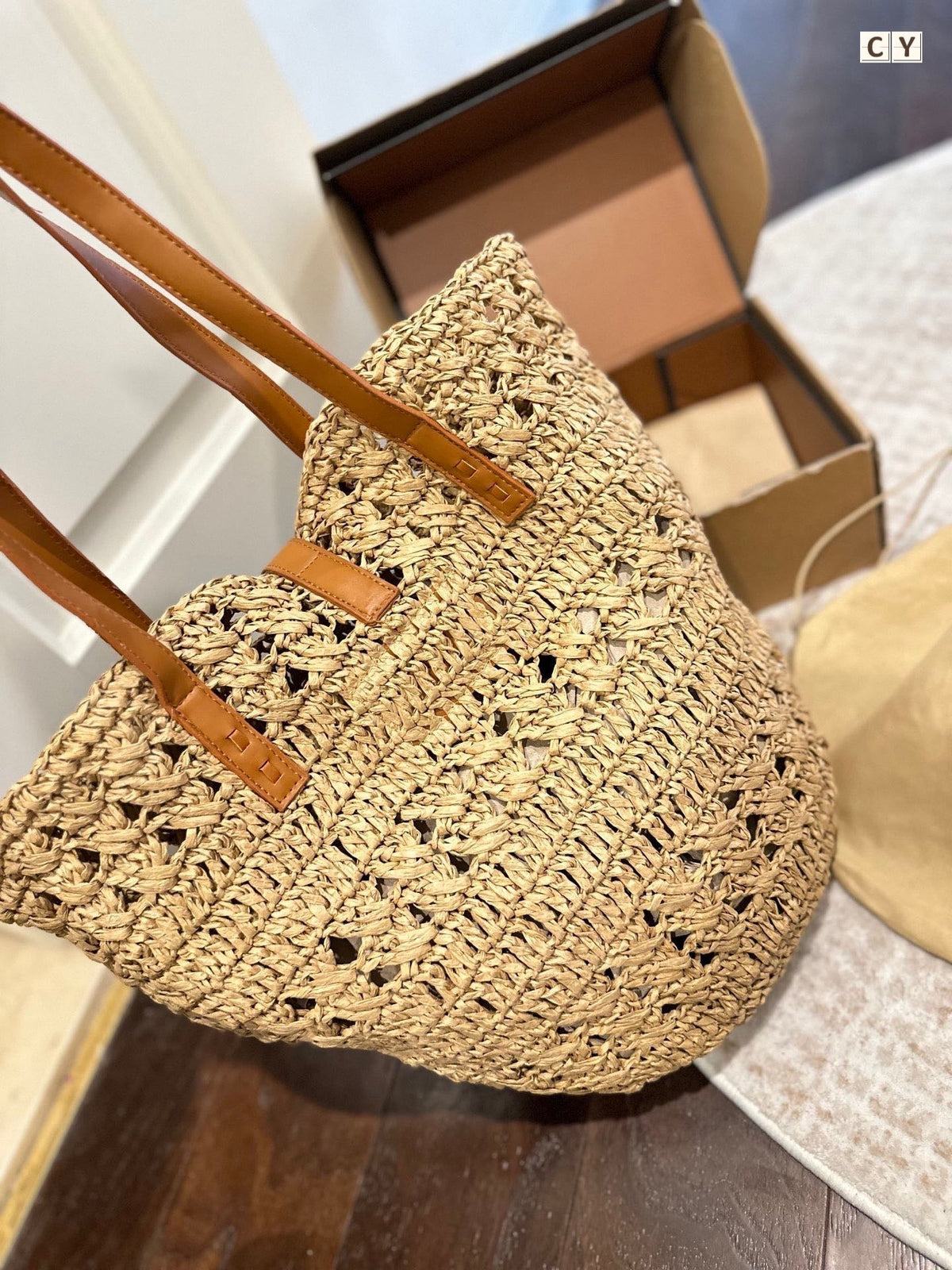 YSL Panier Medium in Raffia and Vegetable-Tanned Leather Tote Bag - Yellow product image 3, provided for visual reference