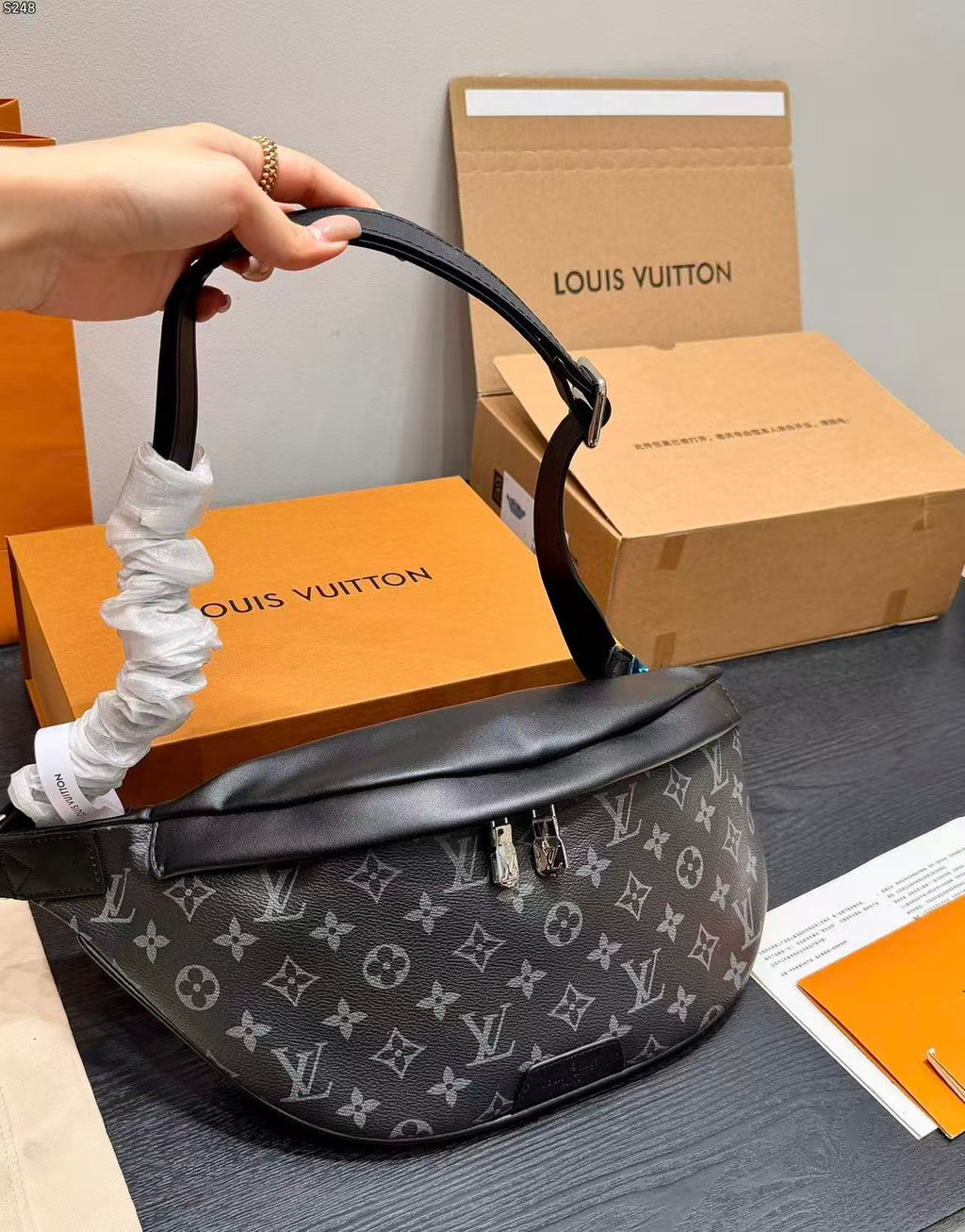 LV Bumbag Monogram Eclipse Canvas Crossbody Bag with Black Leather Trim product image 2, provided for visual reference and