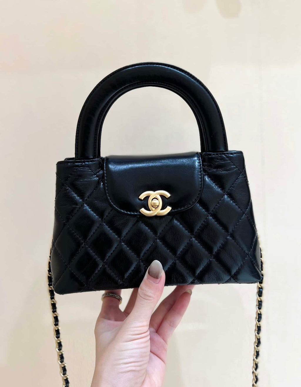 Chanel Kelly Mini Shopping Bag Mini 23K Shiny Aged Calfskin Black product image 1, provided for visual reference and product