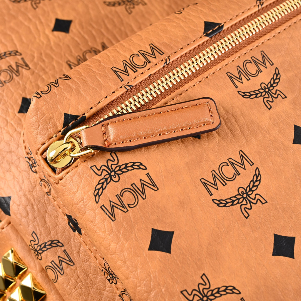 Mcm Stark Visetos Medium Backpack – Cognac Monogram with Gold-Tone Studs - Cognac with Black Monogram Print product image 9,