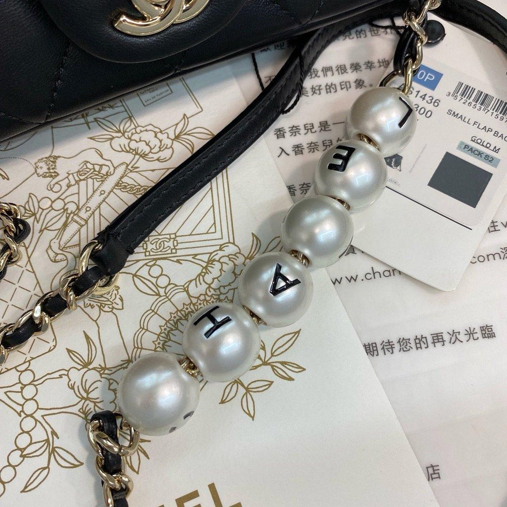 Chanel Pearl Logo Strap Flap Bag Black product image 7, provided for visual reference and product detail review