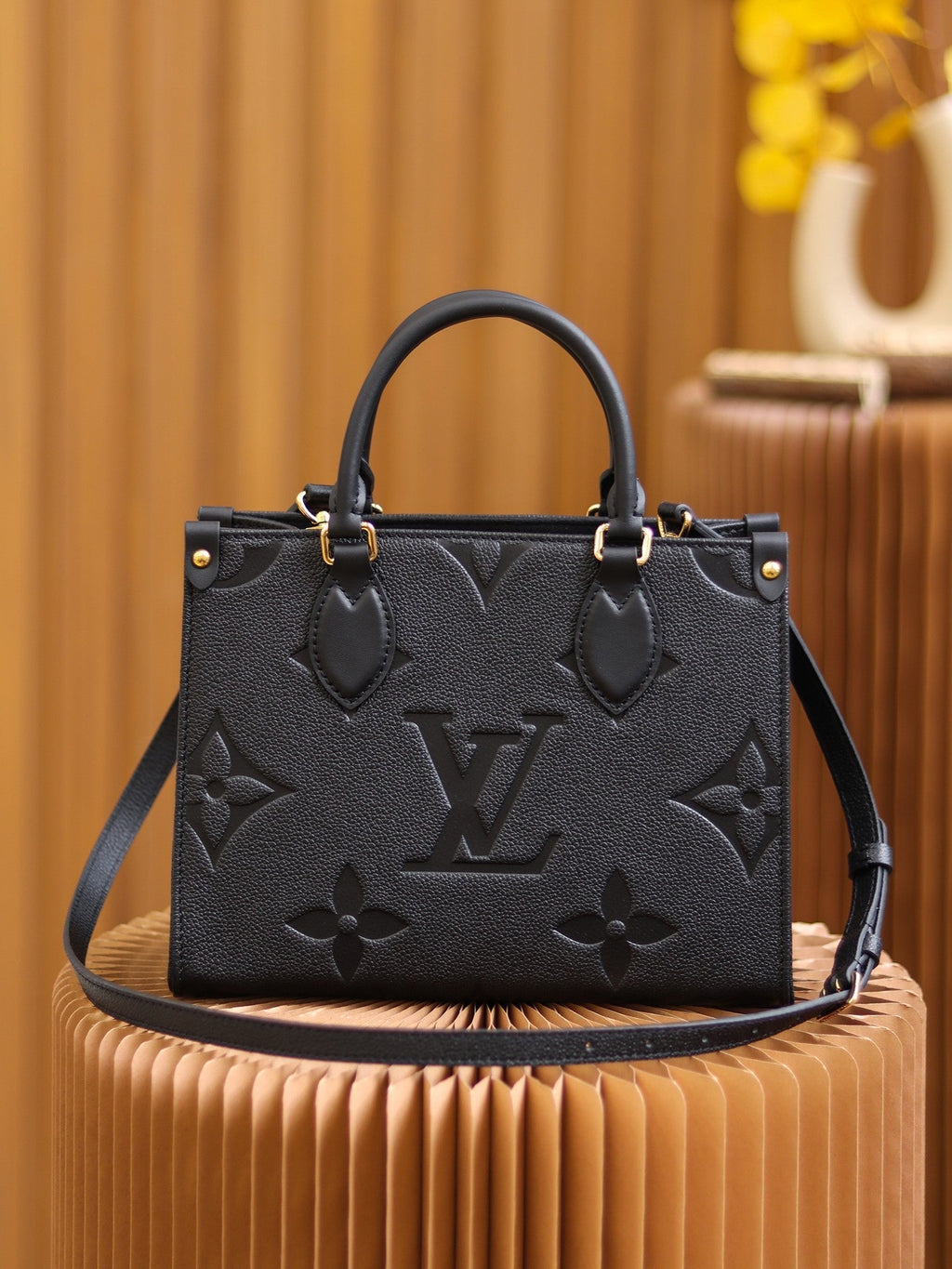 LV OnTheGo PM Monogram Empreinte Leather Tote Handle Bag with Black Leather Trim product image 9, provided for visual