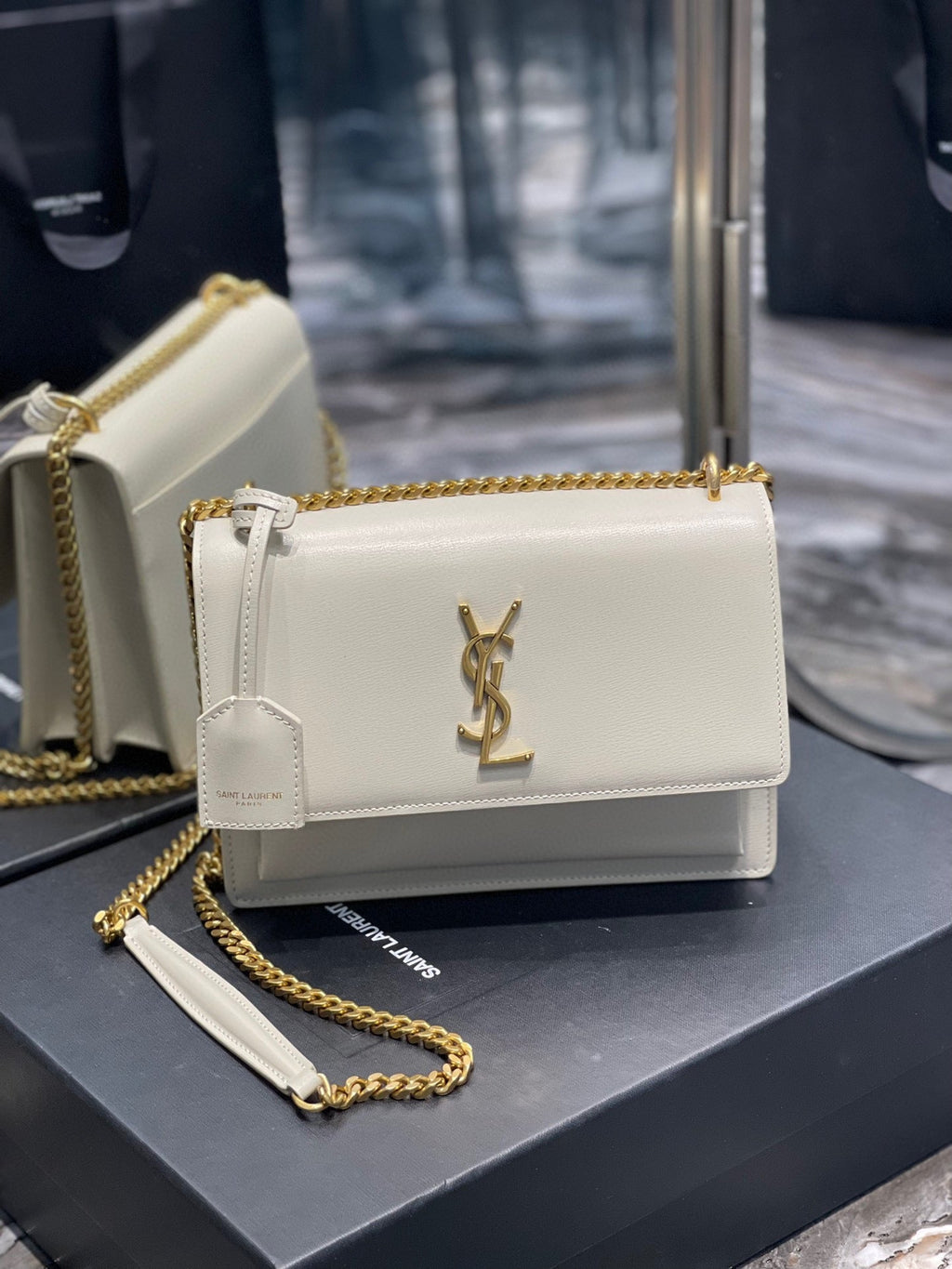 YSL Medium Sunset Bag 22 White Lambskin Gold Tone product image 1, provided for visual reference and product detail review