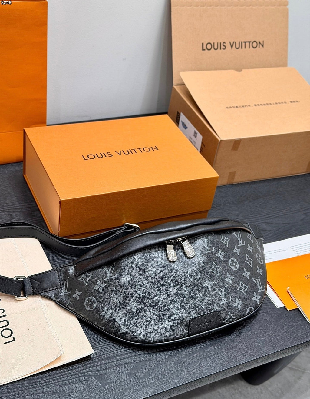 LV Bumbag Monogram Eclipse Canvas Crossbody Bag with Black Leather Trim product image 1, provided for visual reference and