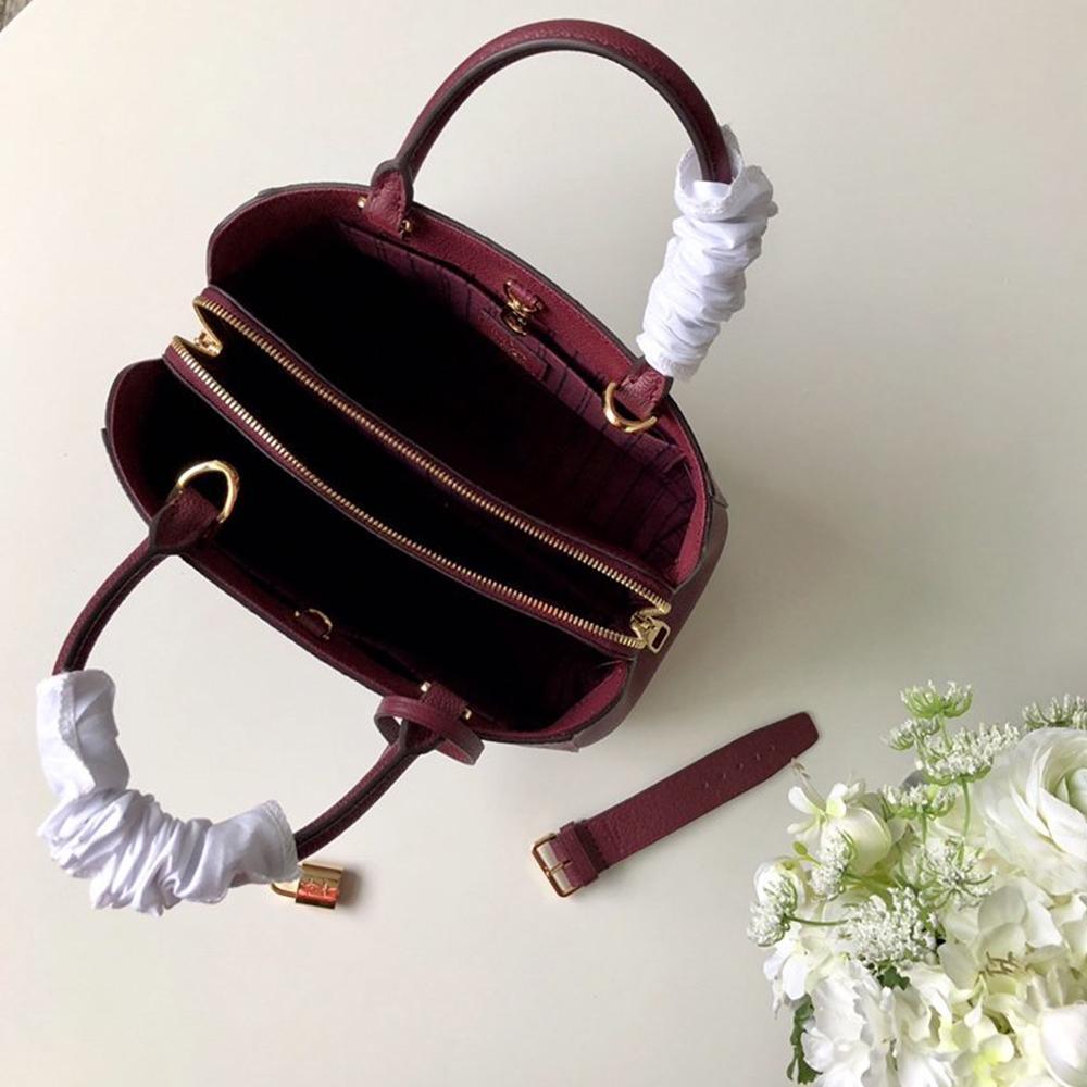 Louis Vuitton Montaigne MM Handbag product image 2, provided for visual reference and product detail review