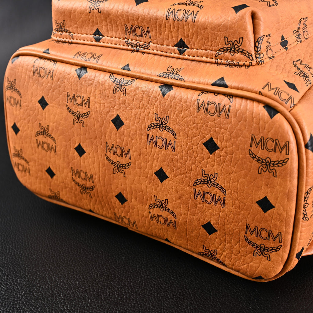 Mcm Stark Visetos Medium Backpack – Cognac Monogram with Gold-Tone Studs - Cognac with Black Monogram Print product image 8,