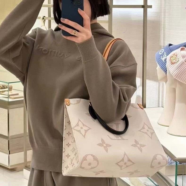 Louis Vuitton OnTheGo MM Tote Bag Monogram Dune Cruise product image 2, provided for visual reference and product detail