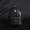 Mcm Stark Visetos Medium Backpack – Black Monogram with Studded Detailing - Black Monogram Print product image 1, provided