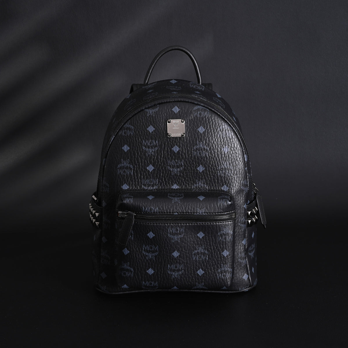 Mcm Stark Visetos Medium Backpack – Black Monogram with Studded Detailing - Black Monogram Print product image 1, provided