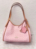 Coach Erin Shoulder Bag in Signature Canvas product image 1, provided for visual reference and product detail review