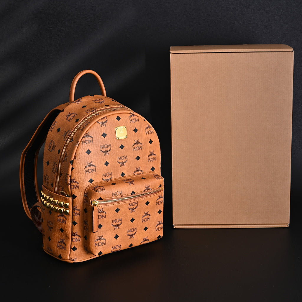 Mcm Stark Visetos Medium Backpack – Cognac Monogram with Gold-Tone Studs - Cognac with Black Monogram Print product image 7,
