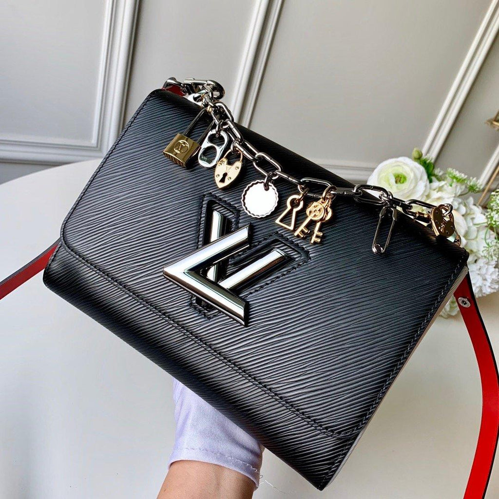 LV Twist MM Epi Leather Handle Crossbody Bag with LV Twist Lock and Love Lock Charms product image 1, provided for visual