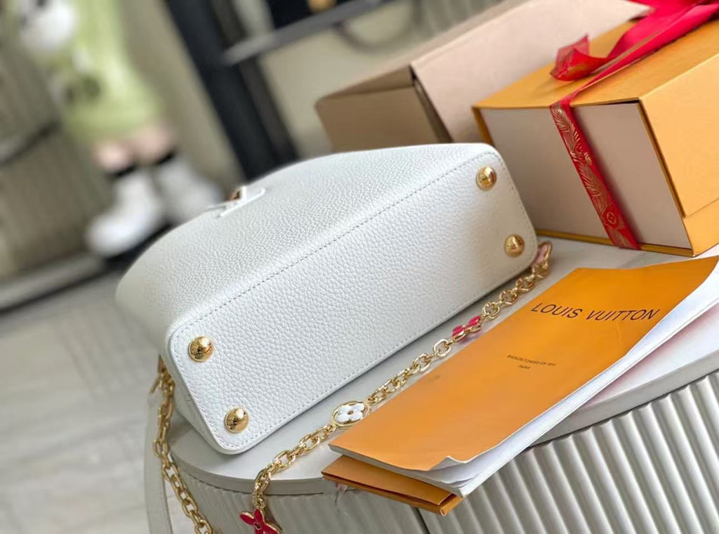 LV Capucines MM Taurillon Leather Handle Shoulder Bag with White Flower Strap product image 3, provided for visual reference