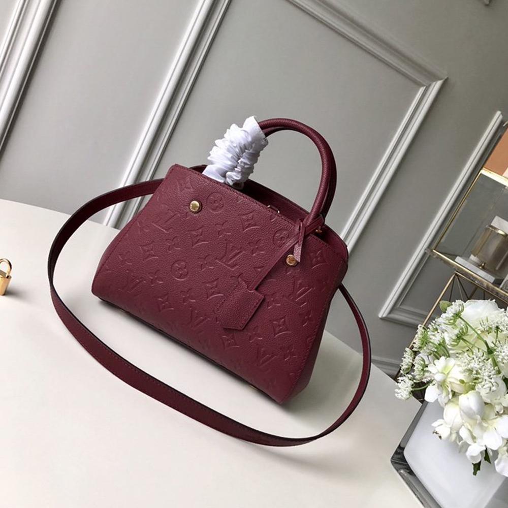 Louis Vuitton Montaigne MM Handbag product image 1, provided for visual reference and product detail review