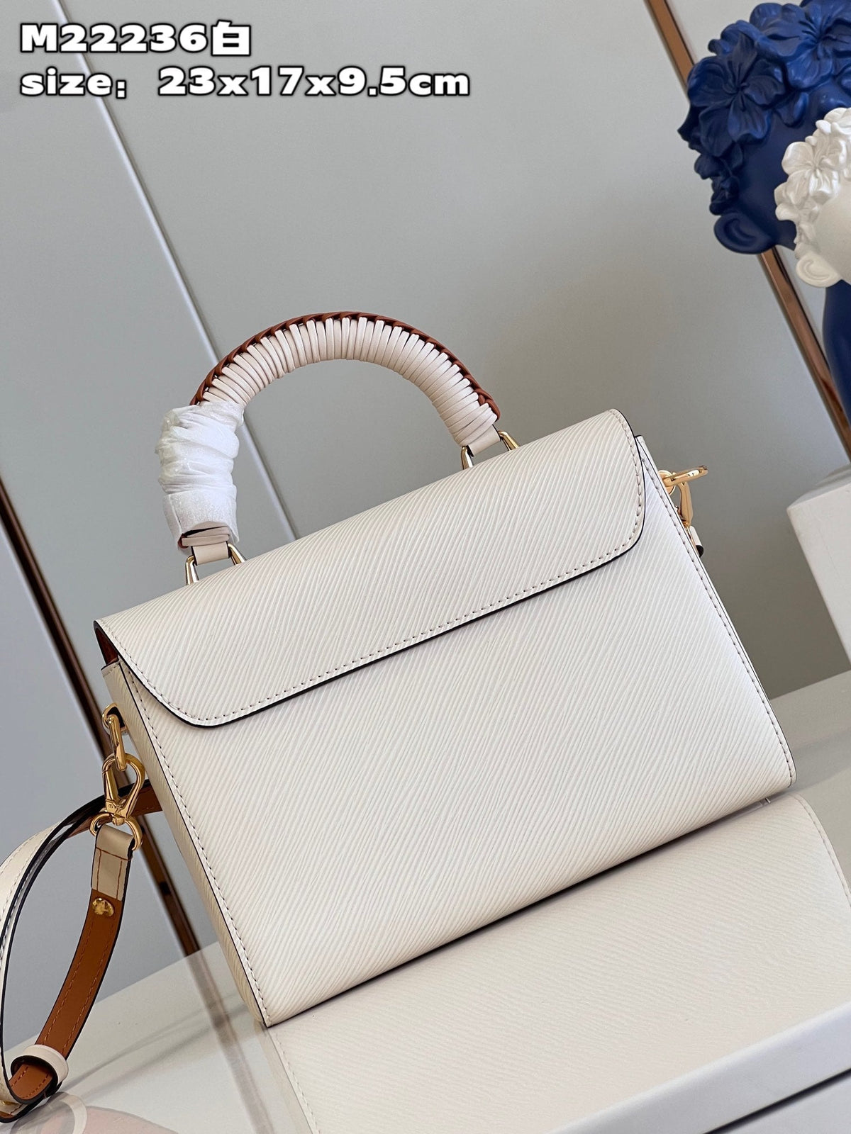 LV Twist MM Epi Leather Handle Crossbody Bag with LV Twist Lock White Quartz product image 2, provided for visual reference