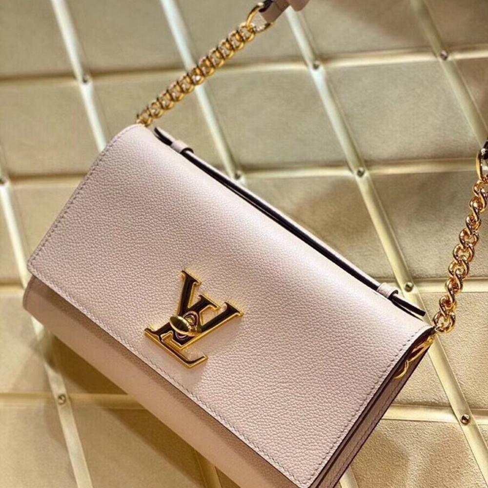 LV Twist Chain Wallet Light Pink Grain Leather product image 1, provided for visual reference and product detail review