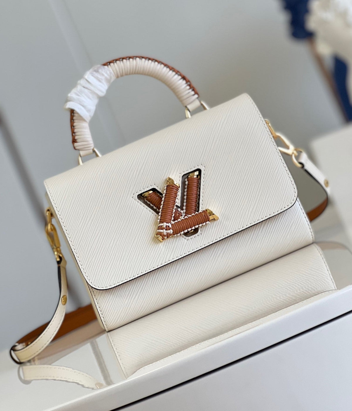 LV Twist MM Epi Leather Handle Crossbody Bag with LV Twist Lock White Quartz product image 7, provided for visual reference