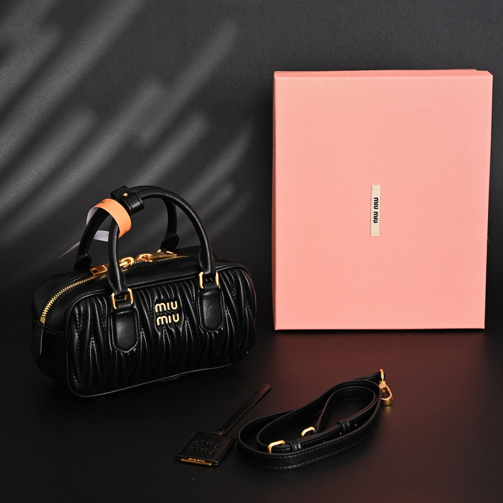 Miu Miu Black Matelassé Leather Top Handle Bag product image 1, provided for visual reference and product detail review