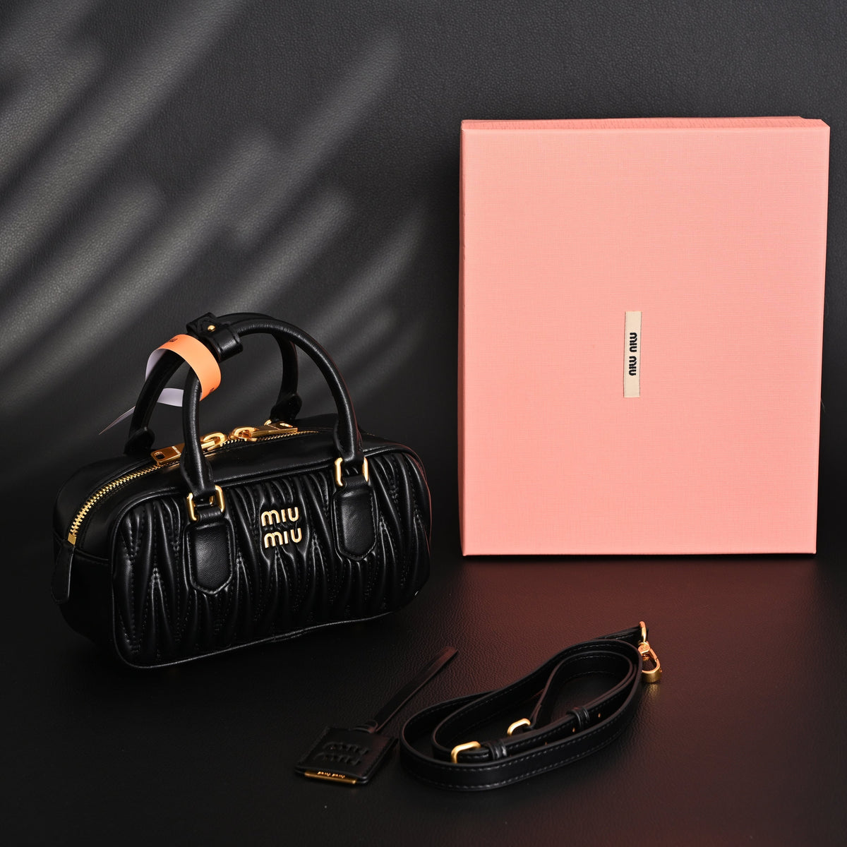 Miu Miu Black Matelassé Leather Top Handle Bag product image 1, provided for visual reference and product detail review
