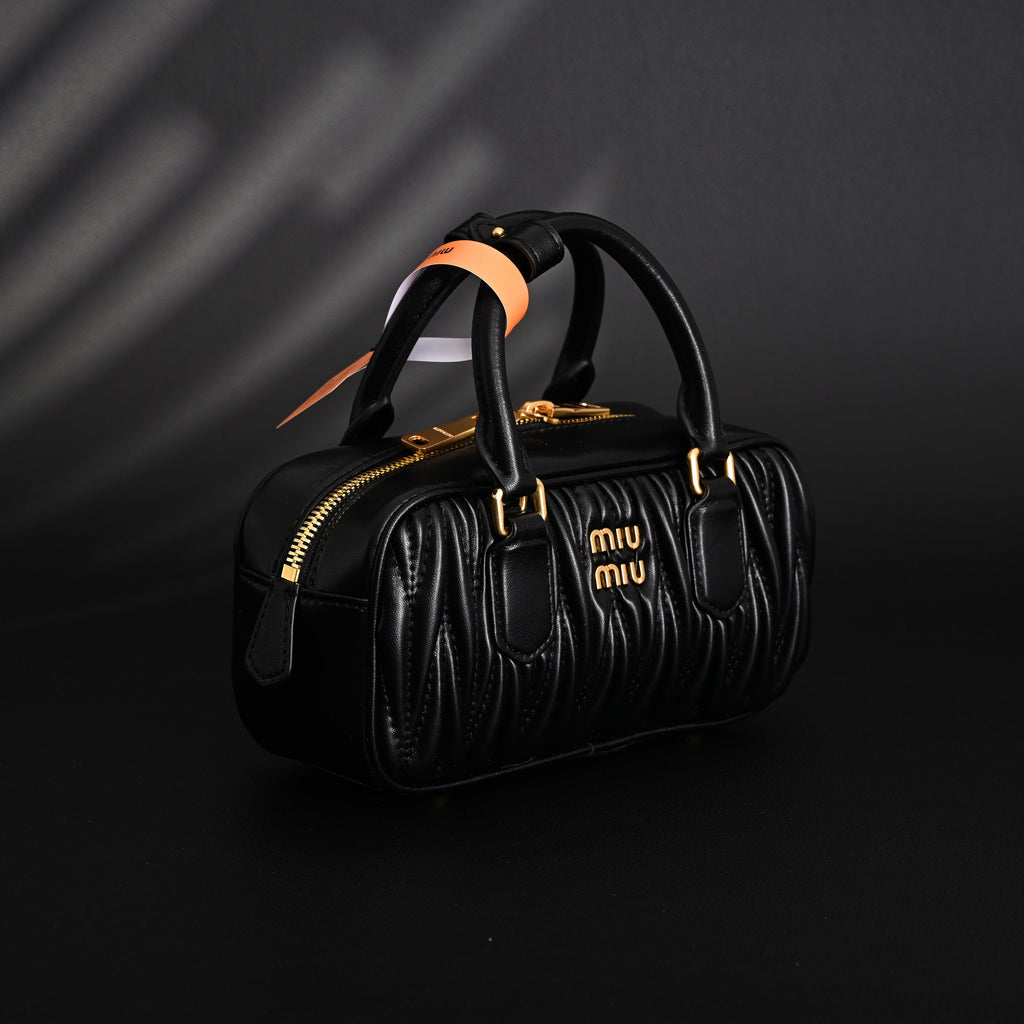 Miu Miu Black Matelassé Leather Top Handle Bag product image 9, provided for visual reference and product detail review