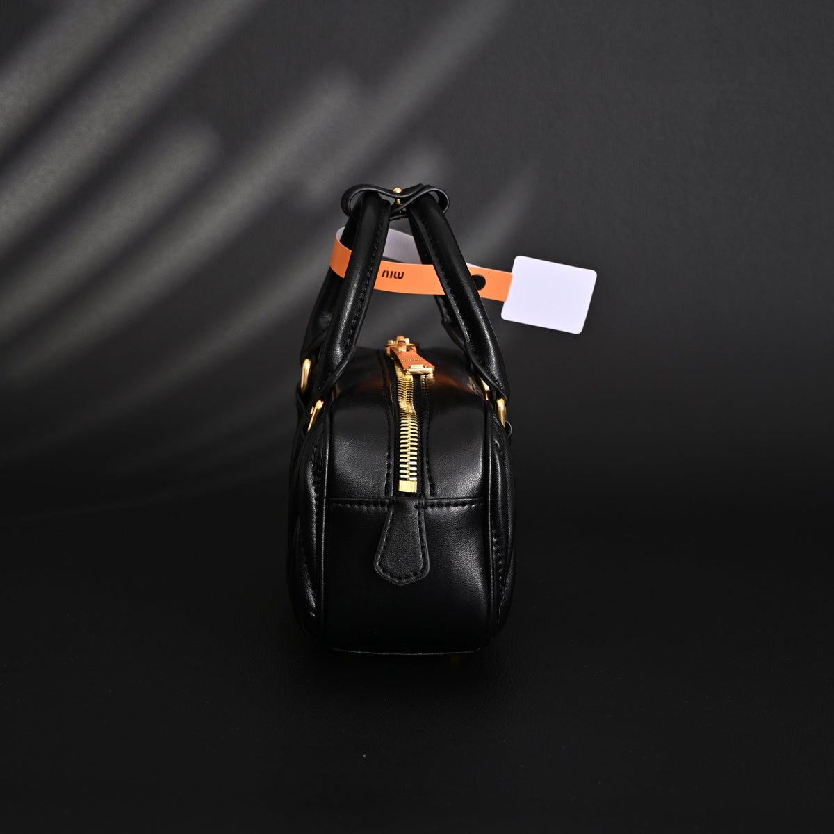 Miu Miu Black Matelassé Leather Top Handle Bag product image 13, provided for visual reference and product detail review