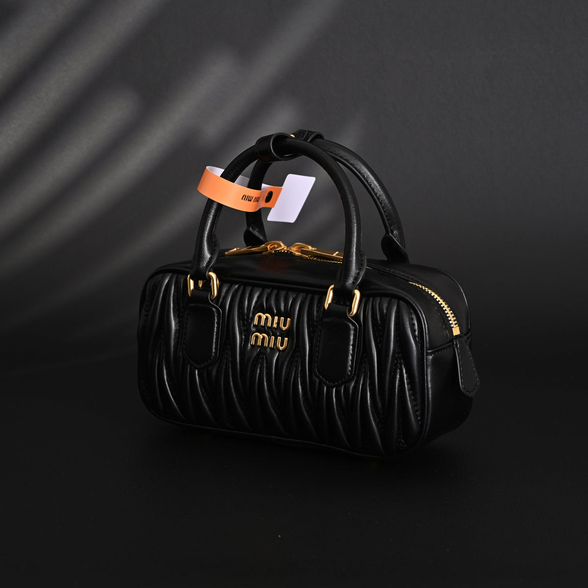 Miu Miu Black Matelassé Leather Top Handle Bag product image 12, provided for visual reference and product detail review