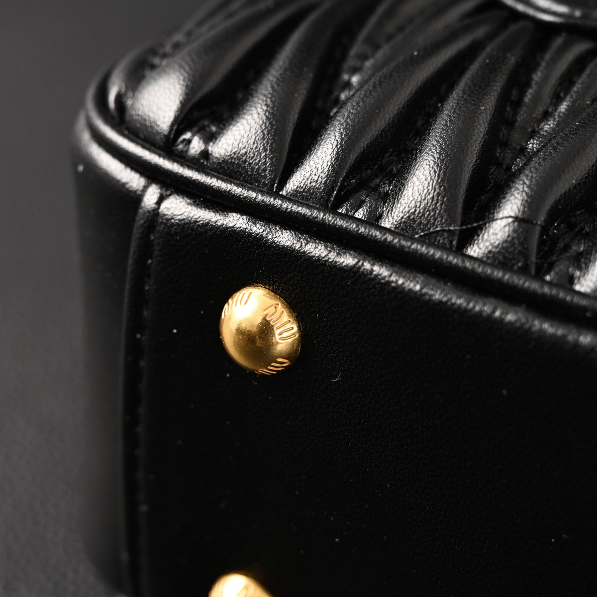 Miu Miu Black Matelassé Leather Top Handle Bag product image 16, provided for visual reference and product detail review