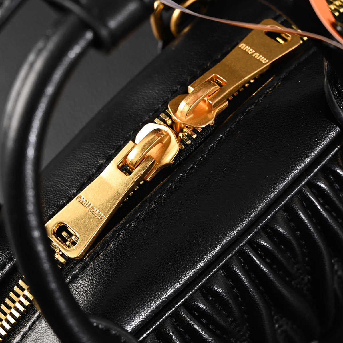 Miu Miu Black Matelassé Leather Top Handle Bag product image 19, provided for visual reference and product detail review
