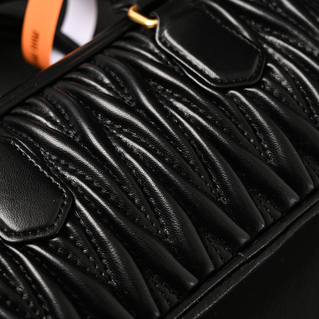 Miu Miu Black Matelassé Leather Top Handle Bag product image 2, provided for visual reference and product detail review