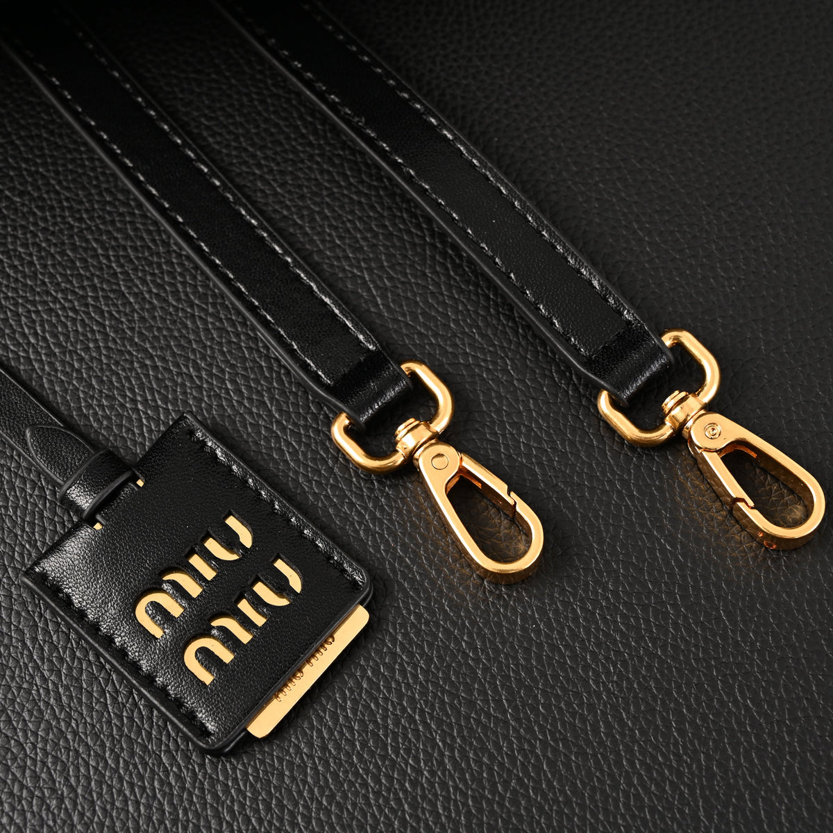 Miu Miu Black Matelassé Leather Top Handle Bag product image 5, provided for visual reference and product detail review