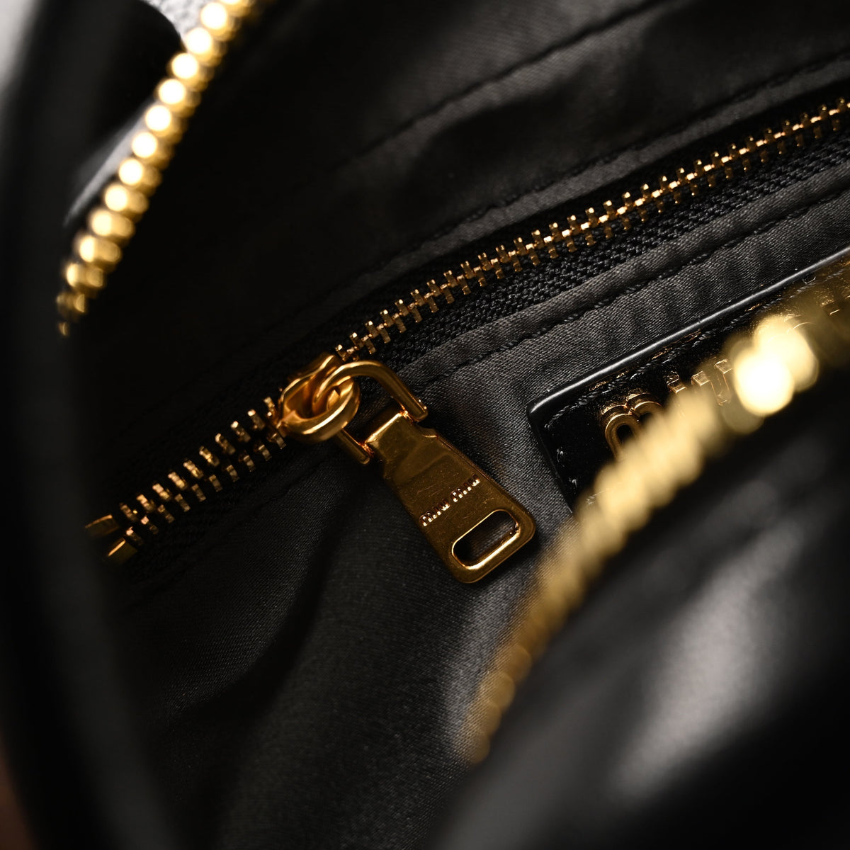 Miu Miu Black Matelassé Leather Top Handle Bag product image 8, provided for visual reference and product detail review