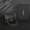 Chanel Classic Flap Bag – Black Quilted Caviar Leather with Gold-Tone Hardware product image 1, provided for visual
