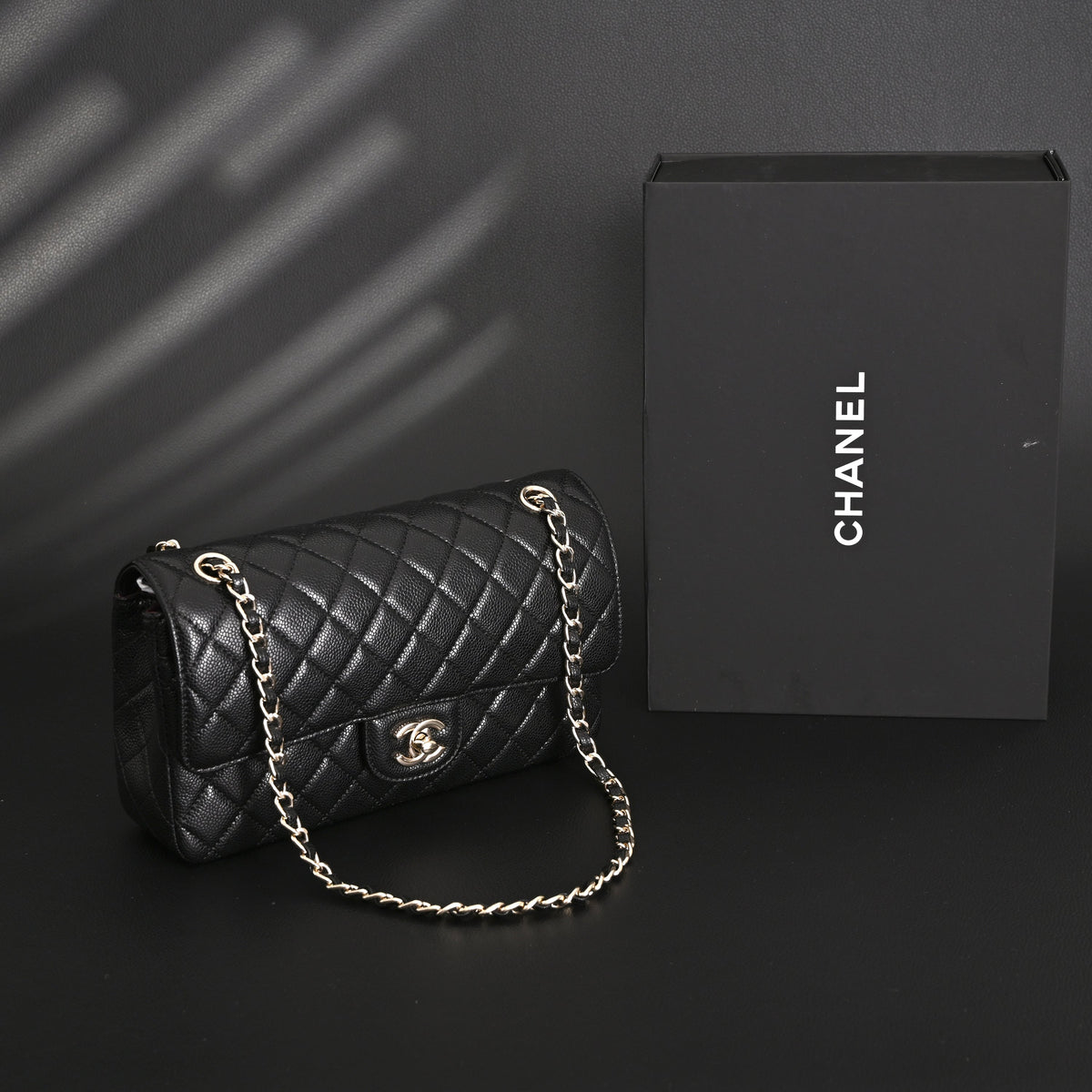 Chanel Classic Flap Bag – Black Quilted Caviar Leather with Gold-Tone Hardware product image 1, provided for visual