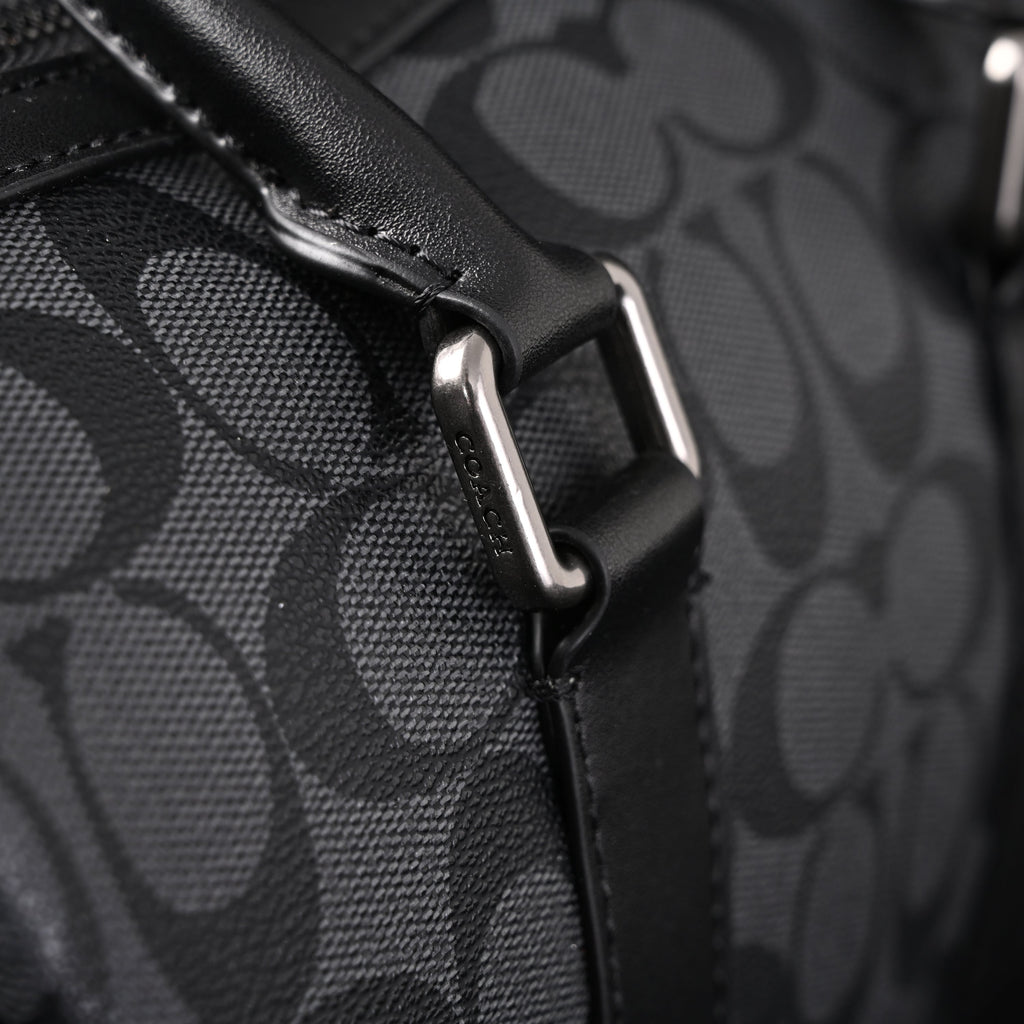 Coach Signature Duffel Bag – Black Monogram Canvas with Leather Trim product image 13, provided for visual reference and