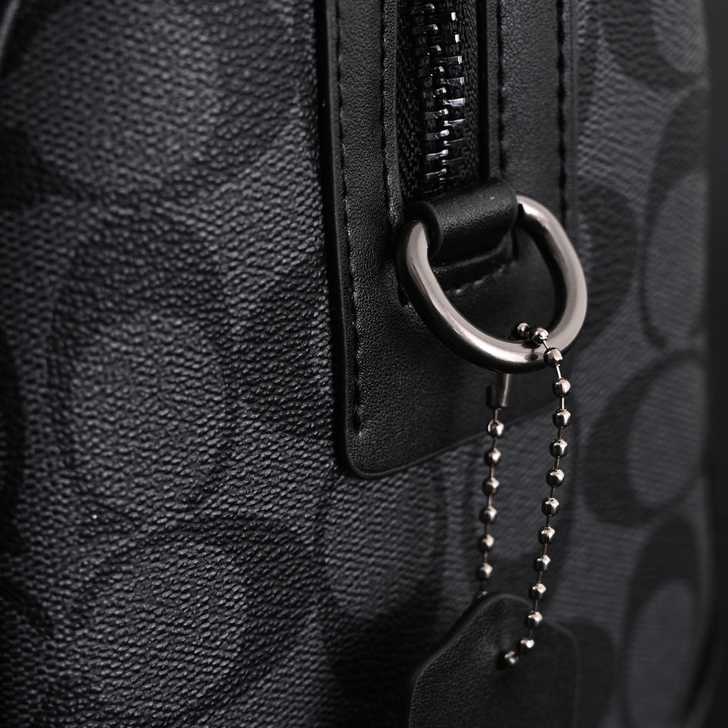 Coach Signature Duffel Bag – Black Monogram Canvas with Leather Trim product image 17, provided for visual reference and