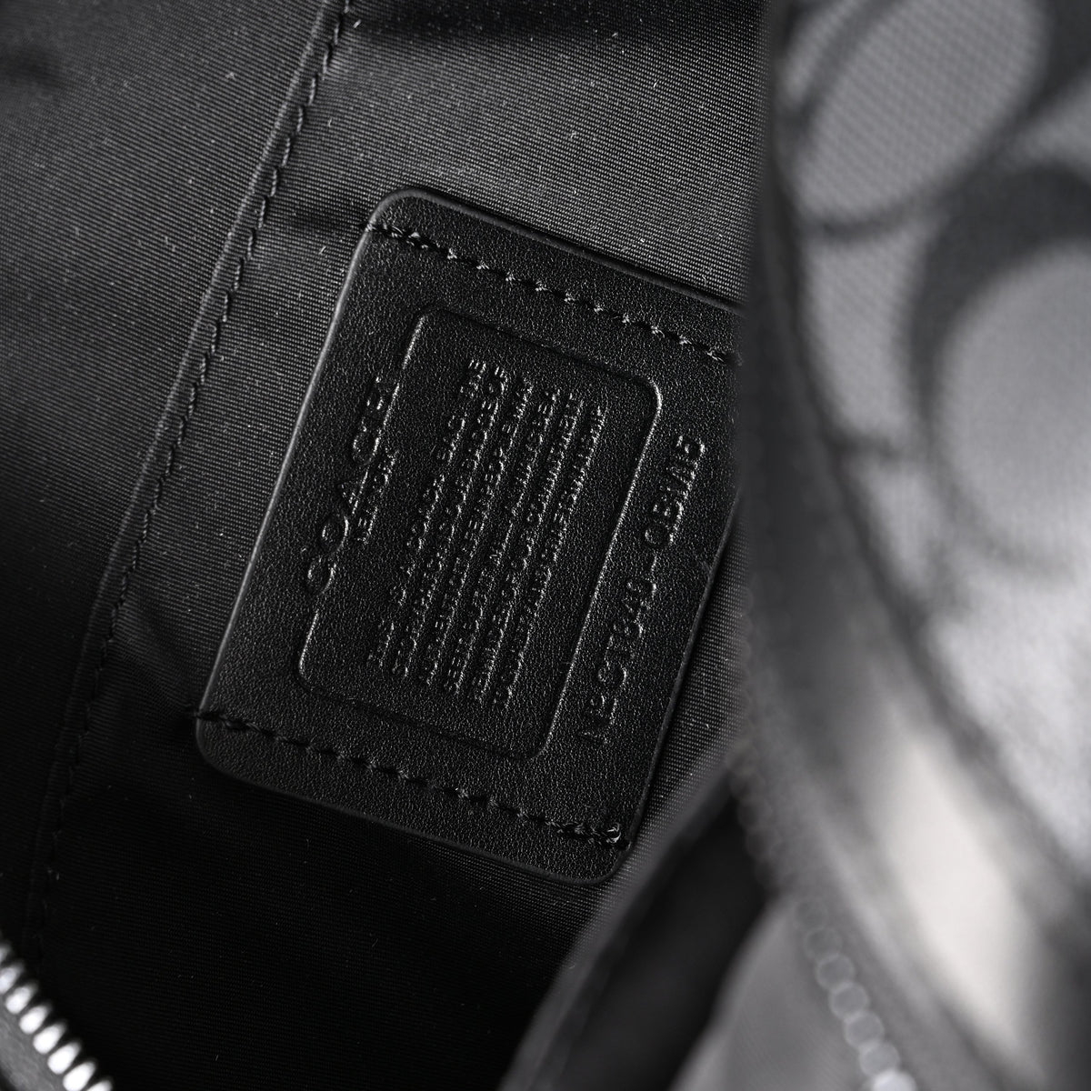 Coach Signature Duffel Bag – Black Monogram Canvas with Leather Trim product image 2, provided for visual reference and