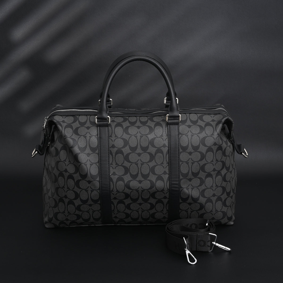 Coach Metropolitan Duffel Bag in Signature Black Canvas product image 1, provided for visual reference and product detail