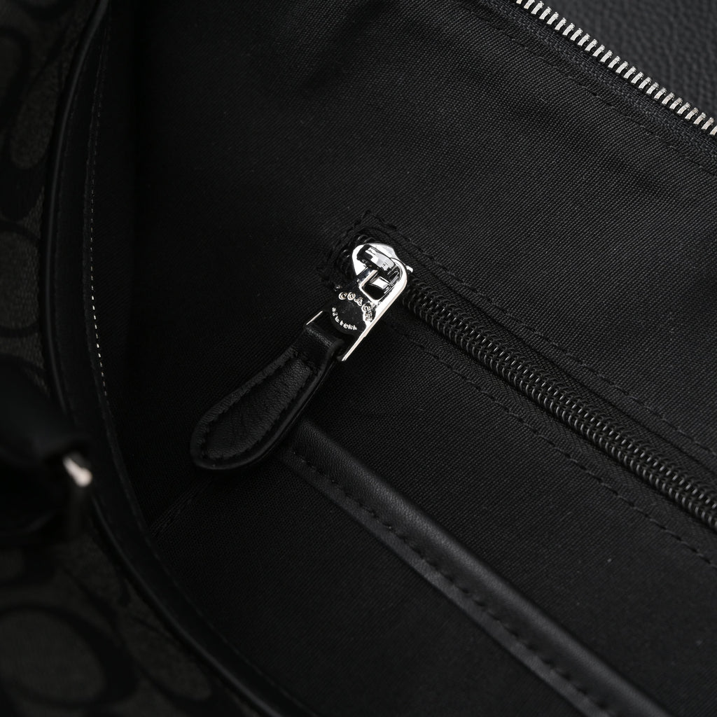 Coach Metropolitan Duffel Bag in Signature Black Canvas product image 2, provided for visual reference and product detail