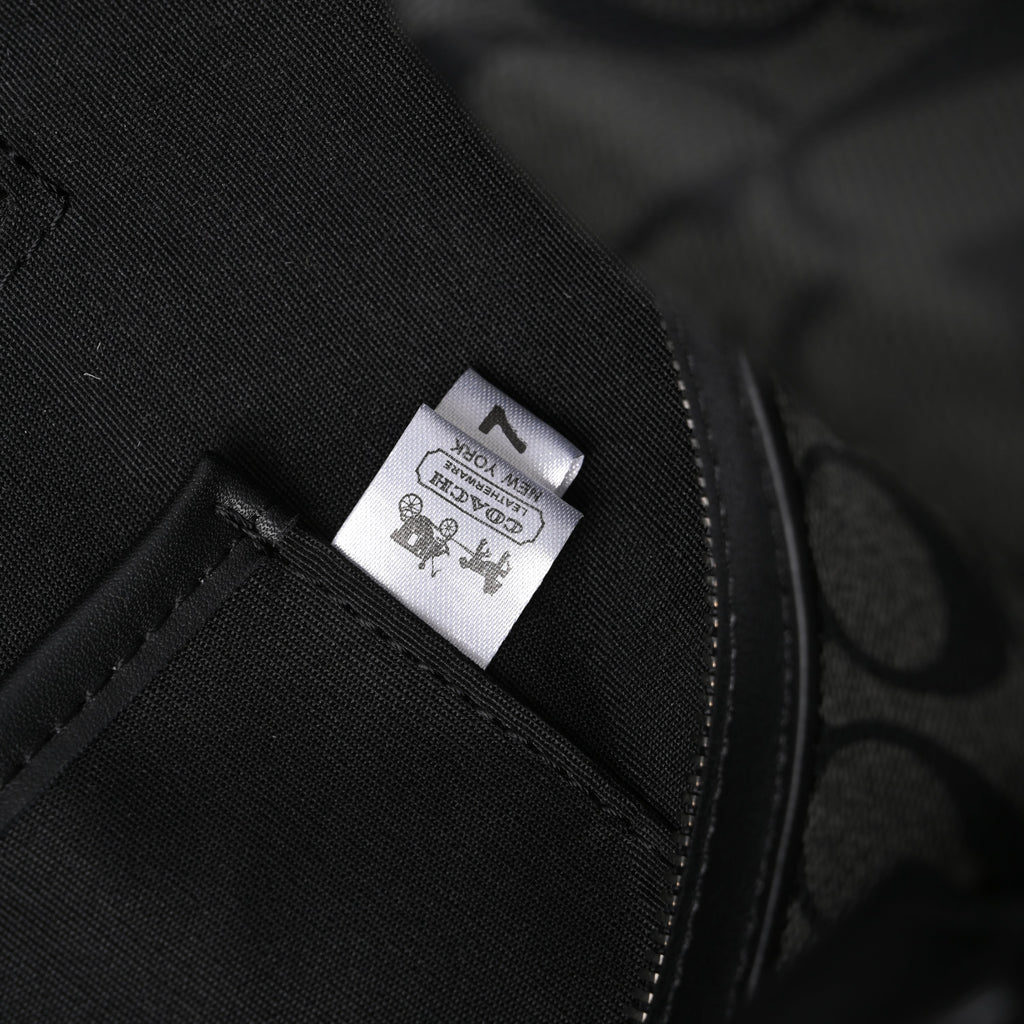Coach Metropolitan Duffel Bag in Signature Black Canvas product image 9, provided for visual reference and product detail
