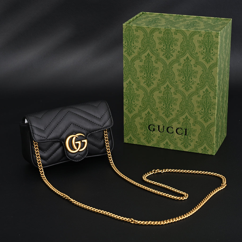 Gucci GG Marmont Matelassé Mini Shoulder Bag – Black Leather with Gold Chain product image 1, provided for visual reference