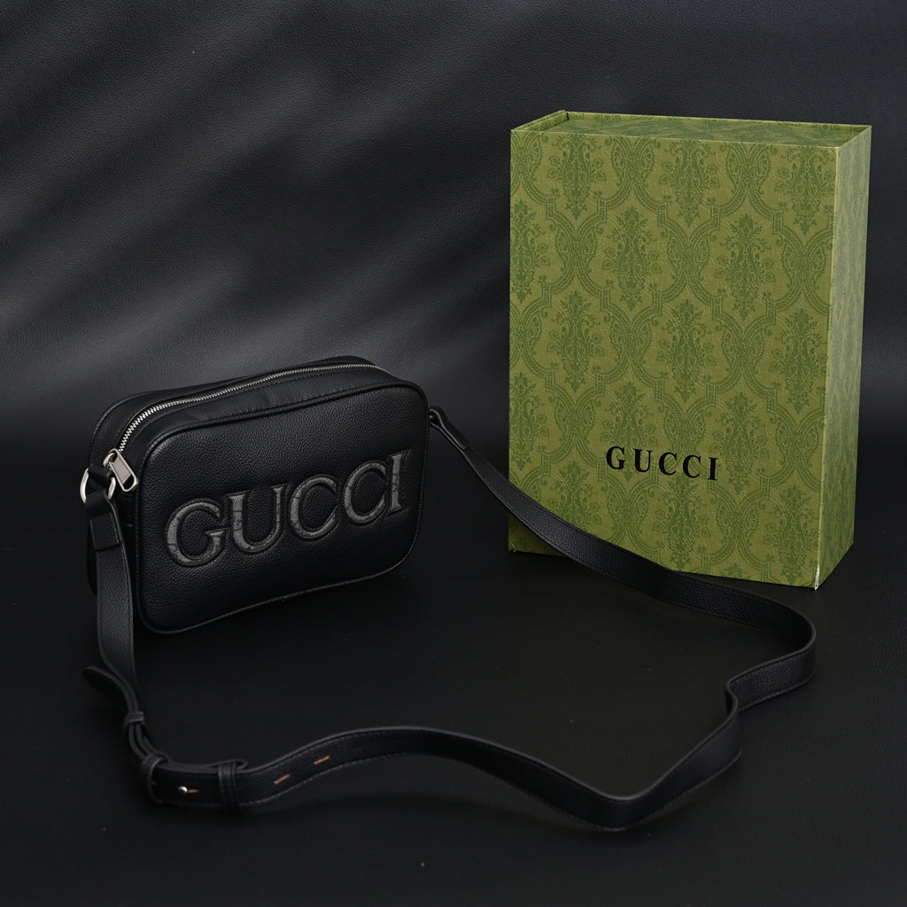 Gucci Black Leather Embossed Logo Belt Bag product image 1, provided for visual reference and product detail review